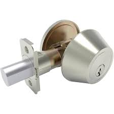 A silver colored cylindrical shaped deadbolt lock